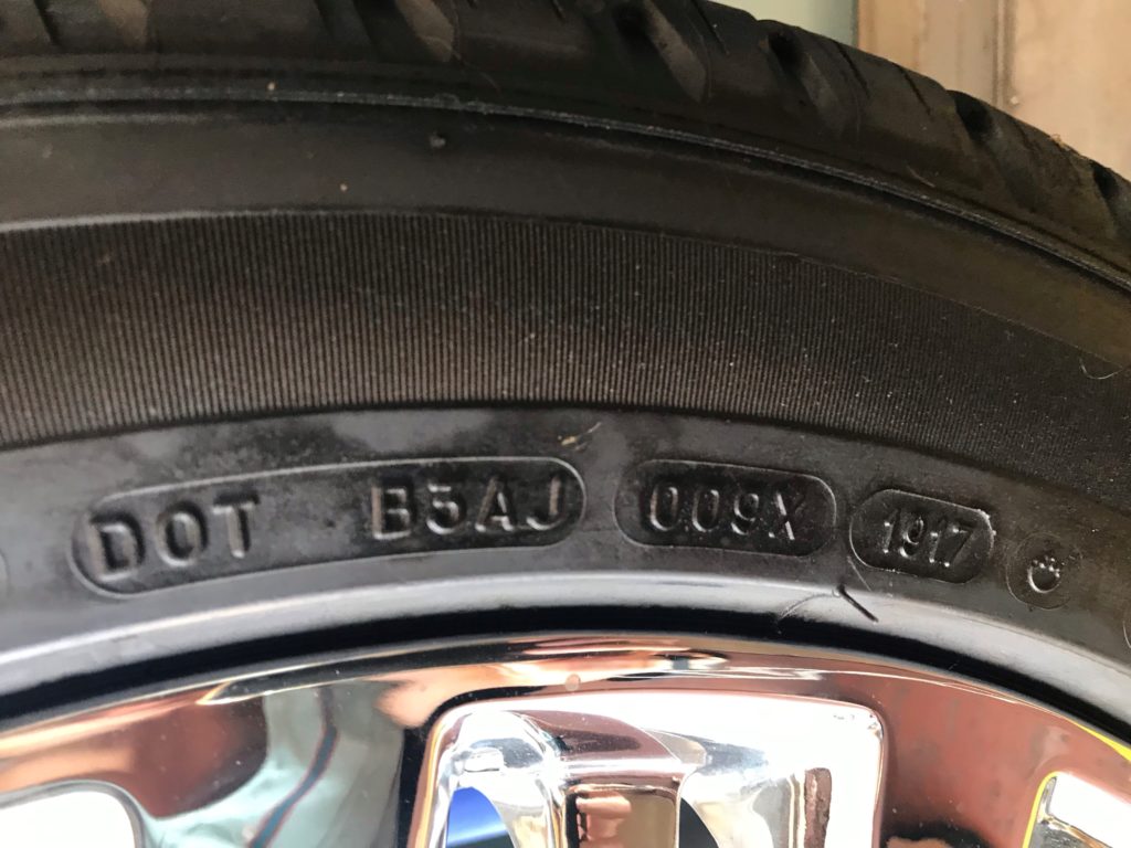 Tire with Department of Transportation Code Showing date of manufacture